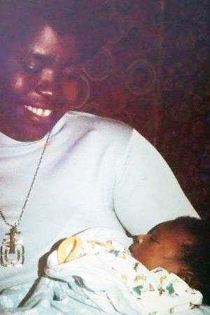 adewale adegoroye with taye adedipe at few months